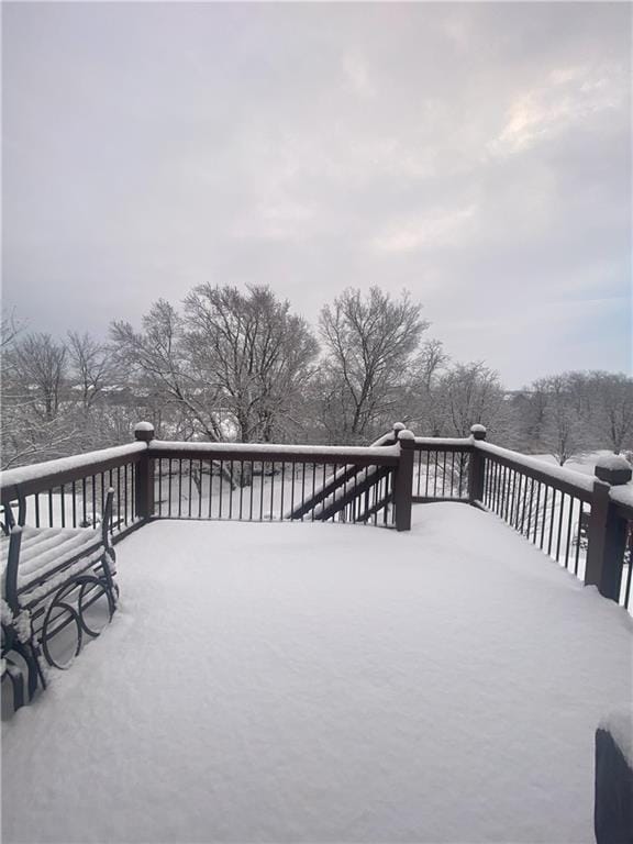 view of snow covered deck