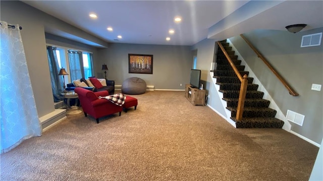 sitting room featuring carpet