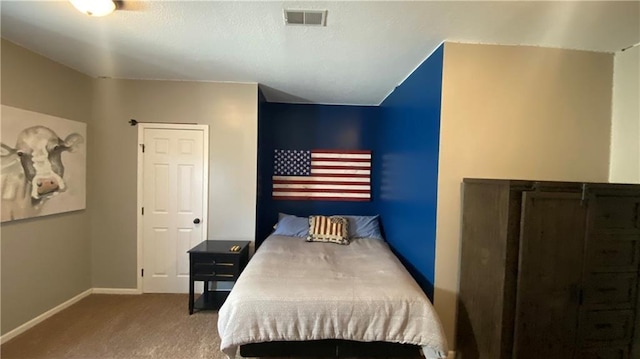 bedroom with light carpet