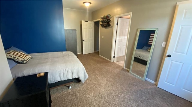 carpeted bedroom with a closet