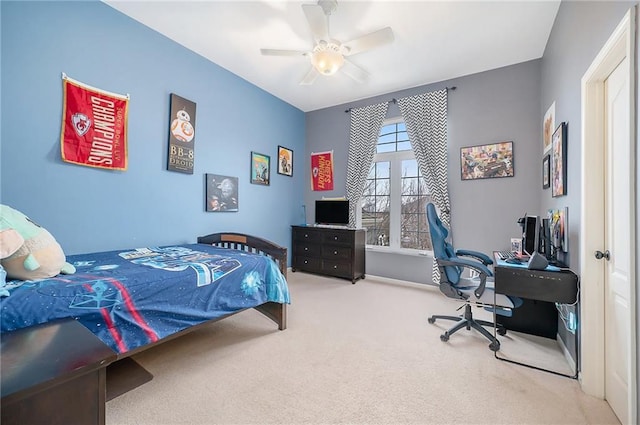 carpeted bedroom featuring ceiling fan