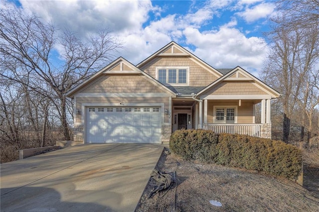 craftsman-style home featuring a garage and a porch