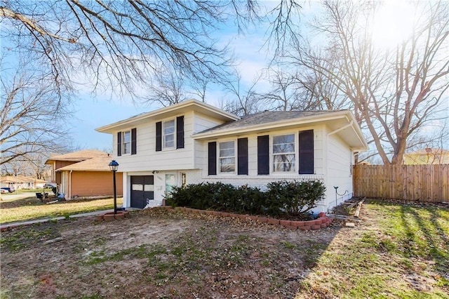 tri-level home featuring a garage