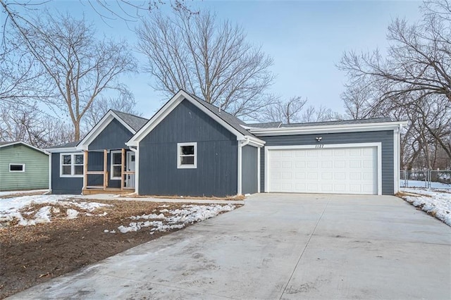 single story home with a garage