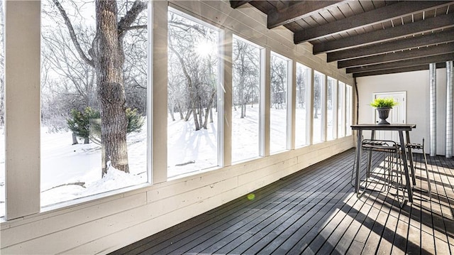 sunroom / solarium with wood ceiling and beamed ceiling