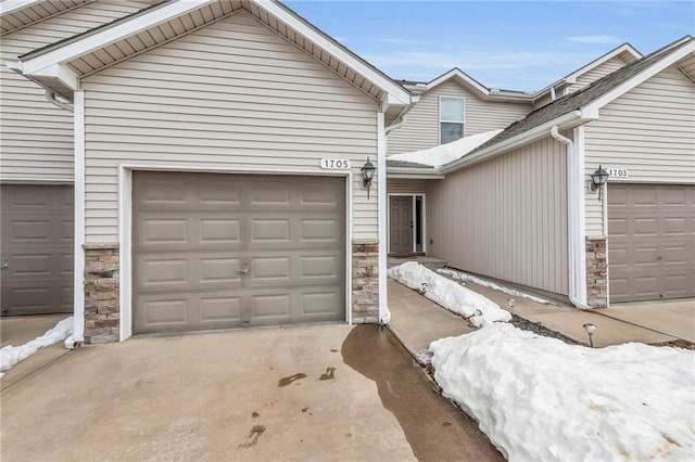 view of snow covered garage