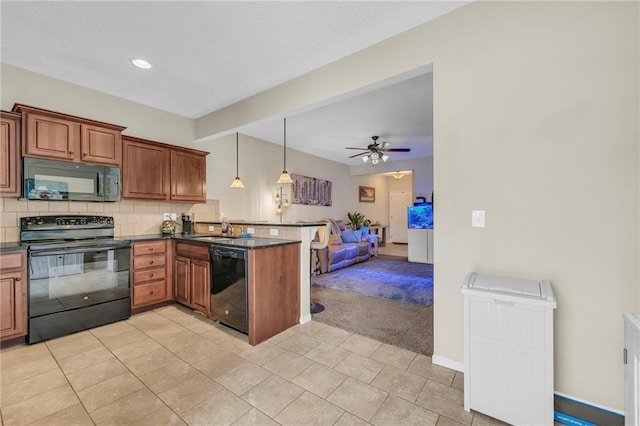 kitchen with decorative light fixtures, black appliances, decorative backsplash, ceiling fan, and kitchen peninsula