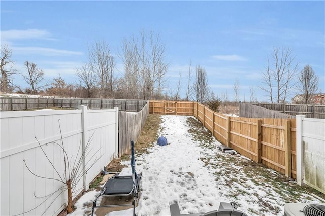 view of yard covered in snow