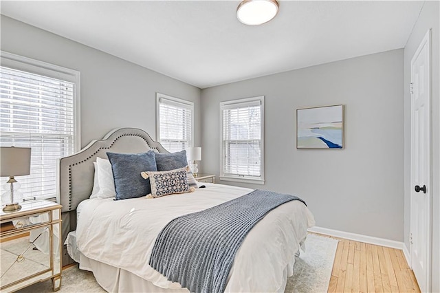 bedroom with light hardwood / wood-style floors