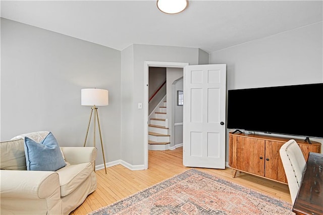 living area featuring hardwood / wood-style floors