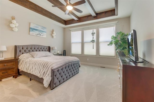 carpeted bedroom with multiple windows and ceiling fan