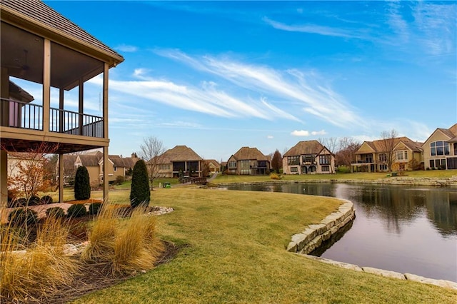 view of yard with a water view