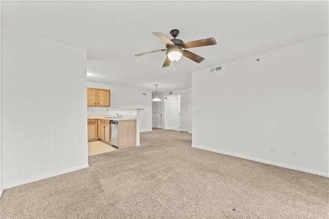 unfurnished living room with light colored carpet and ceiling fan