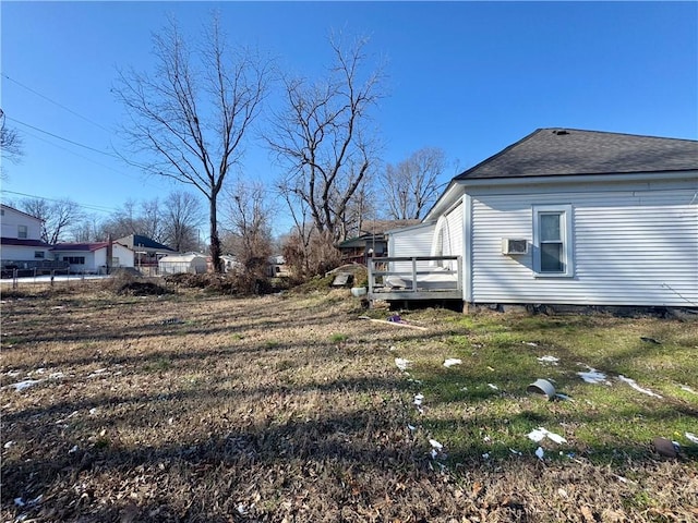 view of home's exterior with a deck