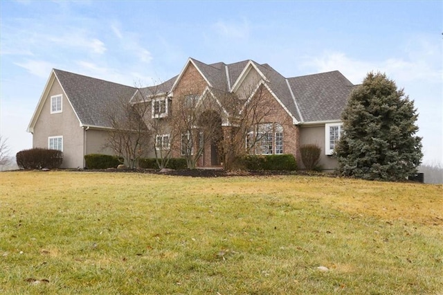 view of property with a front lawn