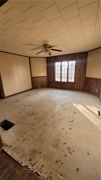 spare room with ceiling fan