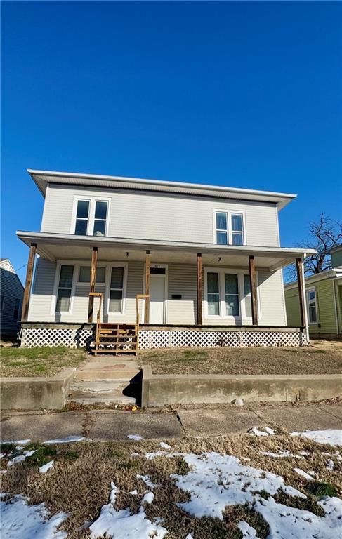 view of front facade featuring covered porch