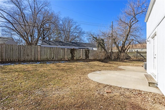 view of yard with cooling unit, a patio, and fence