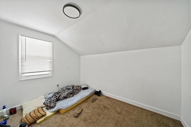 bonus room with lofted ceiling, carpet floors, and baseboards