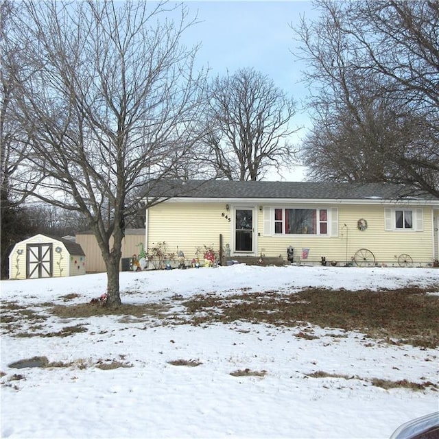 view of front facade with a shed