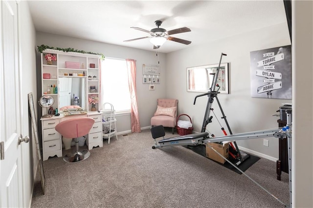 exercise room featuring ceiling fan and carpet floors