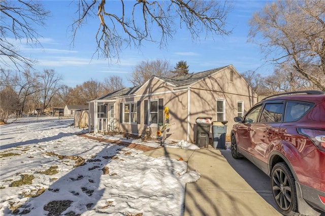 view of snow covered property