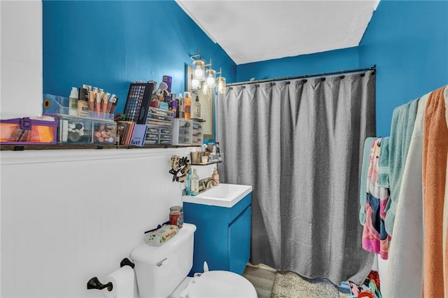 bathroom featuring sink and toilet