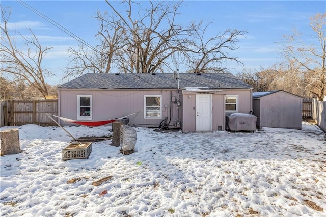 view of snow covered house