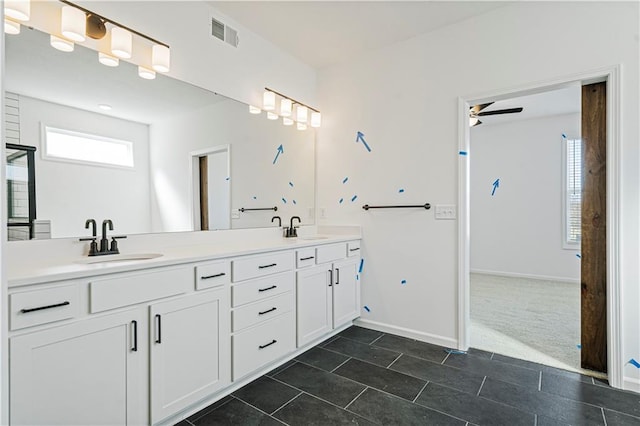 bathroom with vanity, ceiling fan, and tile patterned flooring