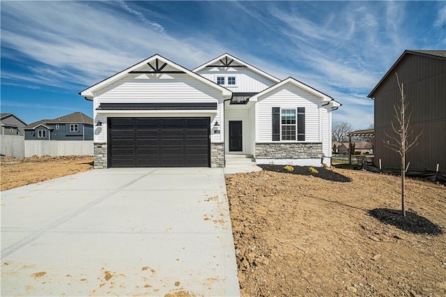 craftsman inspired home featuring a garage