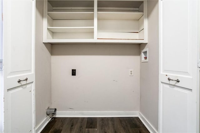 laundry area with washer hookup, dark wood-type flooring, hookup for an electric dryer, laundry area, and baseboards