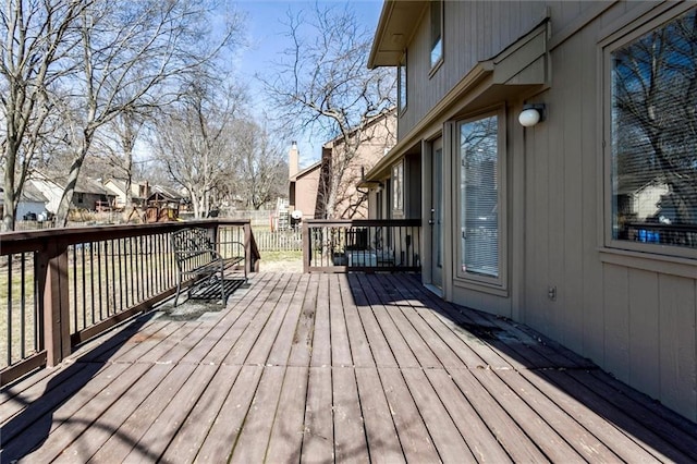 wooden terrace featuring a residential view