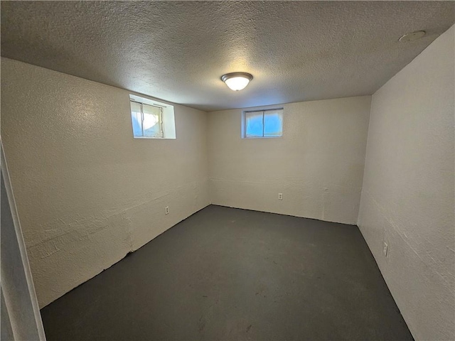 basement with a textured ceiling