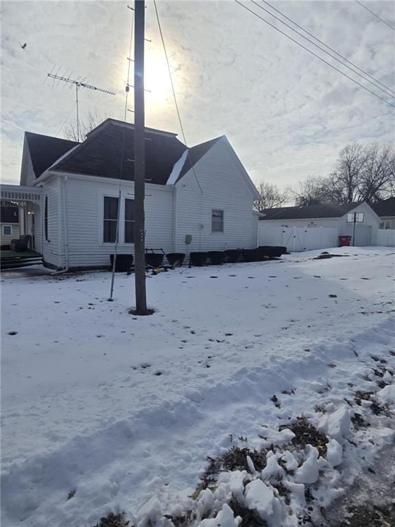 view of snow covered house