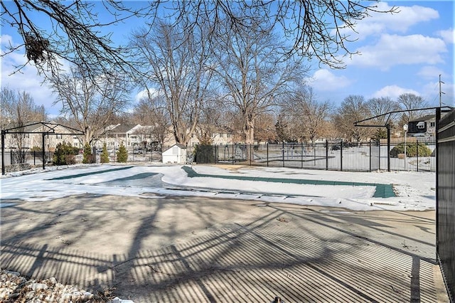 view of snow covered pool