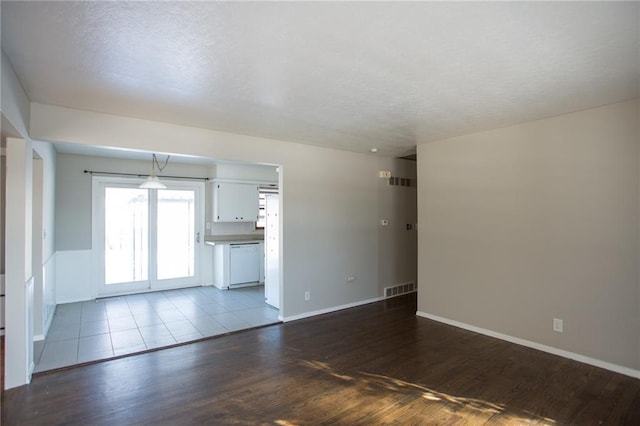 unfurnished living room featuring light hardwood / wood-style floors