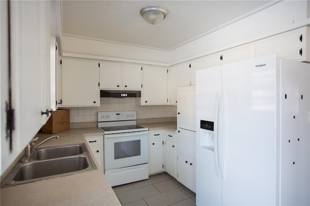 kitchen featuring white cabinetry, sink, white appliances, and light tile patterned floors