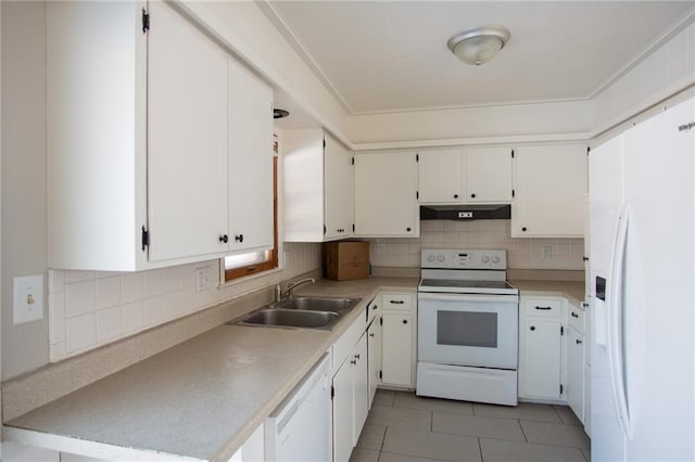 kitchen featuring white cabinetry, sink, backsplash, and white appliances