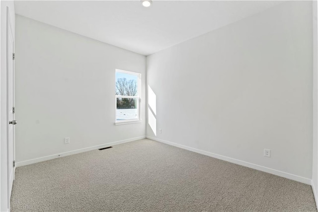 unfurnished room with carpet