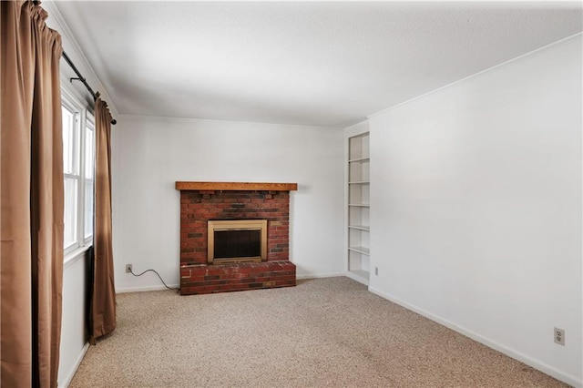 unfurnished living room featuring light colored carpet and a brick fireplace