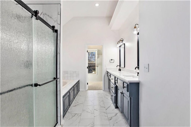 bathroom featuring vanity, lofted ceiling, and plus walk in shower