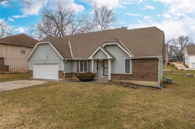 view of front of house featuring a garage and a front lawn