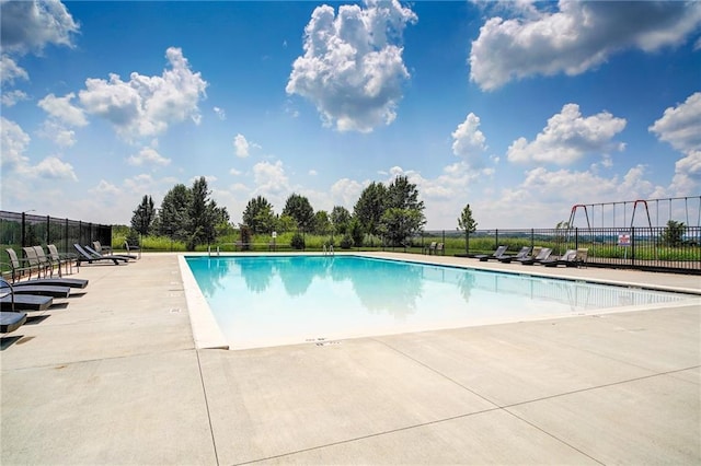 view of pool featuring a patio