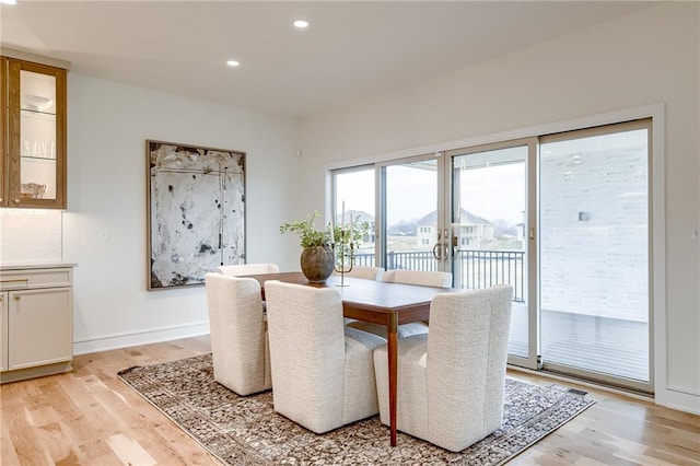 dining room featuring light hardwood / wood-style floors