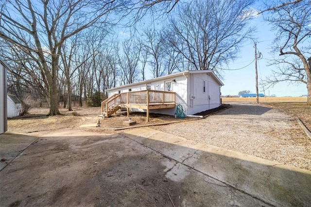 view of front of house featuring a wooden deck