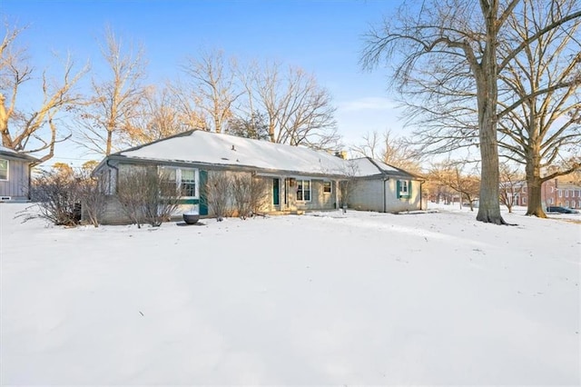 view of snow covered property