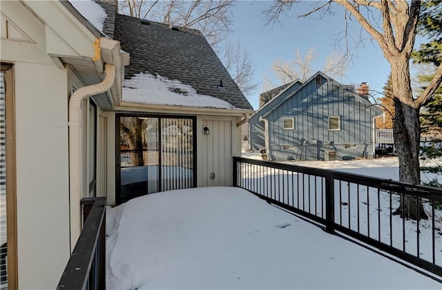 view of snow covered deck