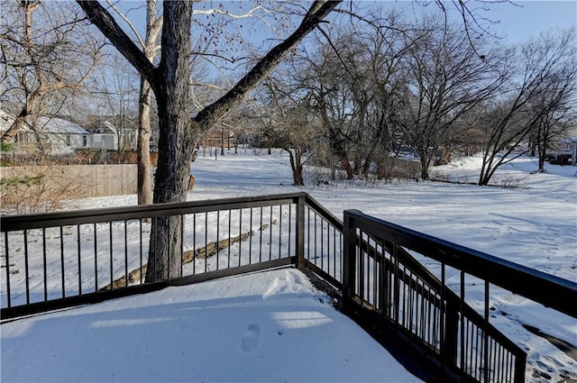 view of snow covered deck