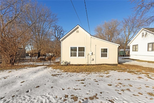 view of snow covered property