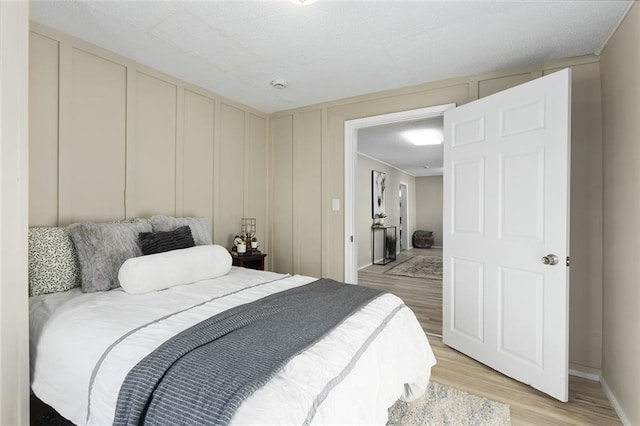 bedroom featuring light hardwood / wood-style floors